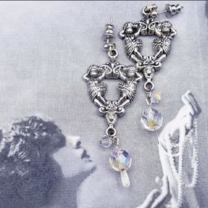 Vintage silver tone figural AB earrings